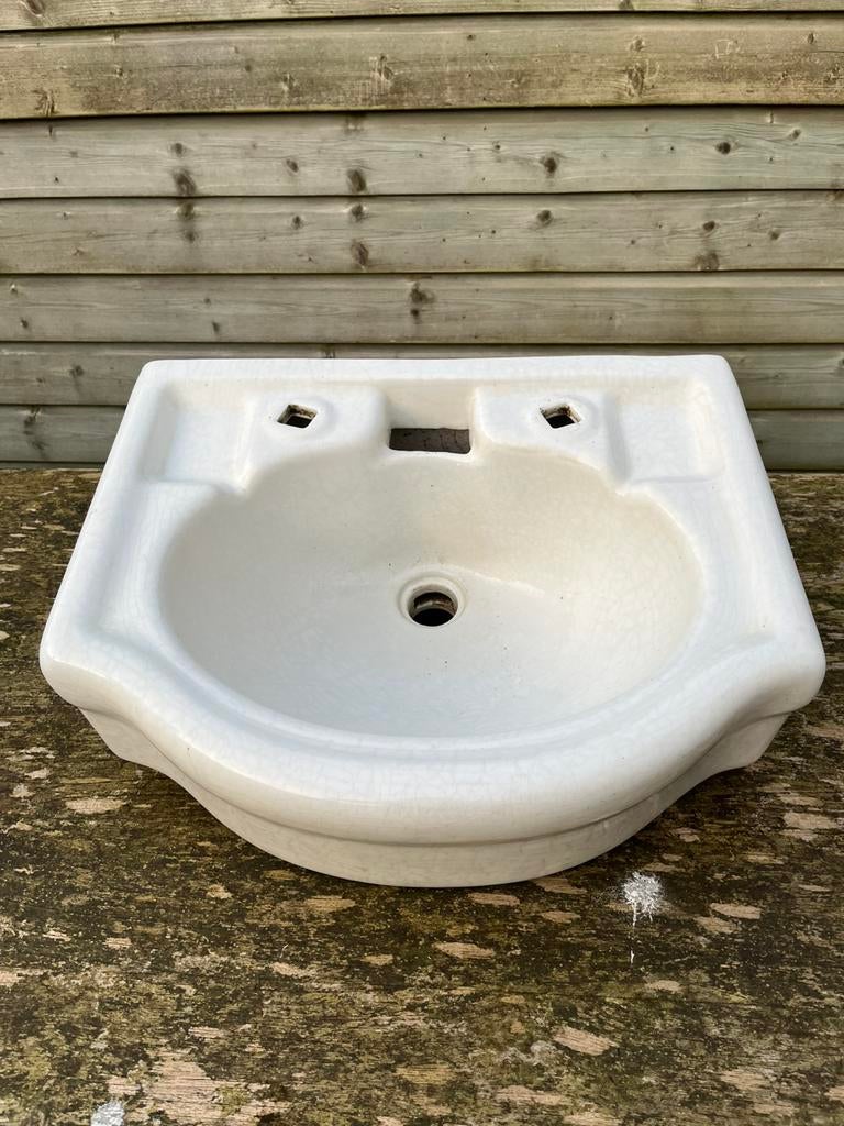 Sphinx wastafel, Ophalen