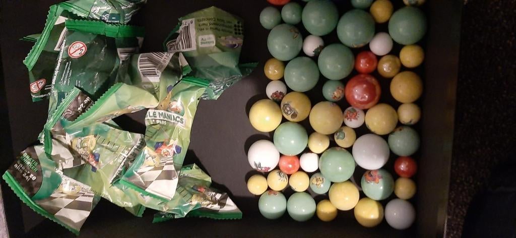 Knikkers met zakjes, Ophalen