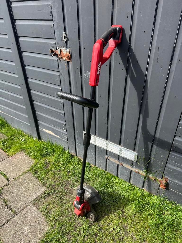SKIL Grastrimmer Accu, Ophalen of Verzenden, Gebruikt, 30 tot 50 cm, Accu