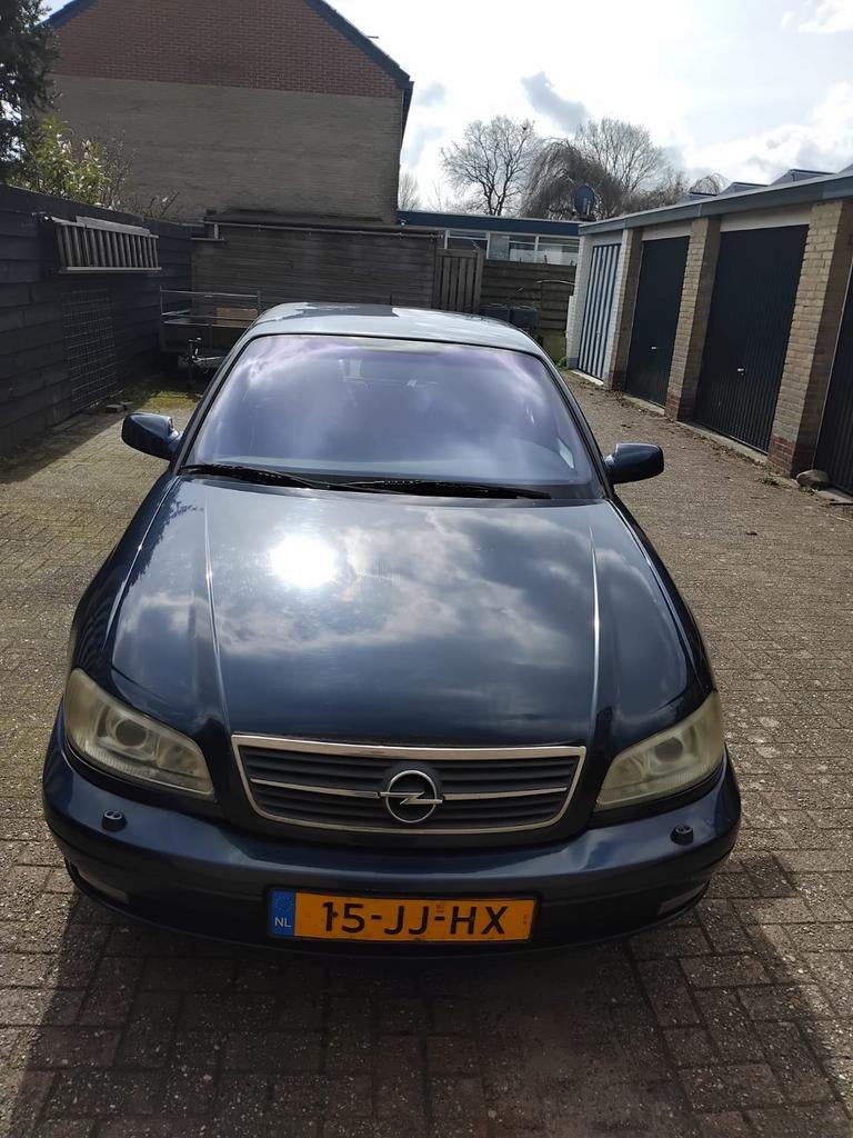 Opel Omega 2.2 I 16V SDN AUT 2002 Blauw, Auto's, Omega, Achterwielaandrijving, 4 cilinders, Blauw