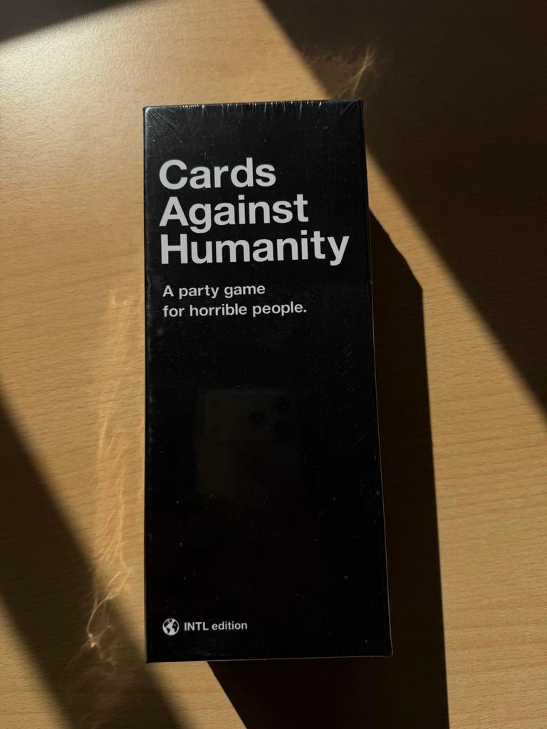 Cards against humanity international edition nieuw, Ophalen of Verzenden, Nieuw