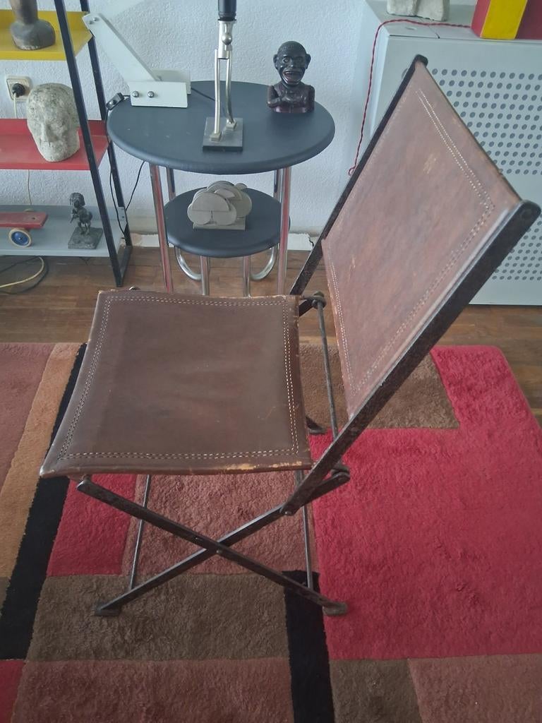 Antieke smeedijzeren klapstoel met tuigleder 19e eeuws, Antiek en Kunst, Ophalen of Verzenden