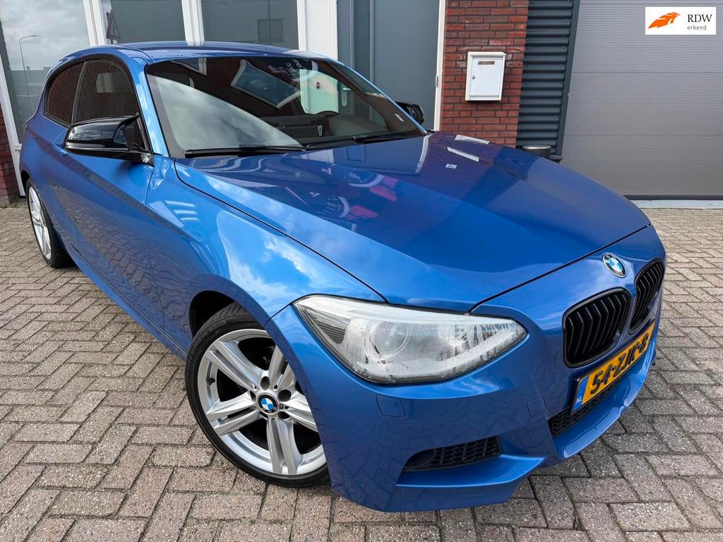 BMW 1-serie 114i Upgrade Edition / Leder / Navi / PDC / Carp, 1-Serie, Euro 5, Achterwielaandrijving, Gebruikt