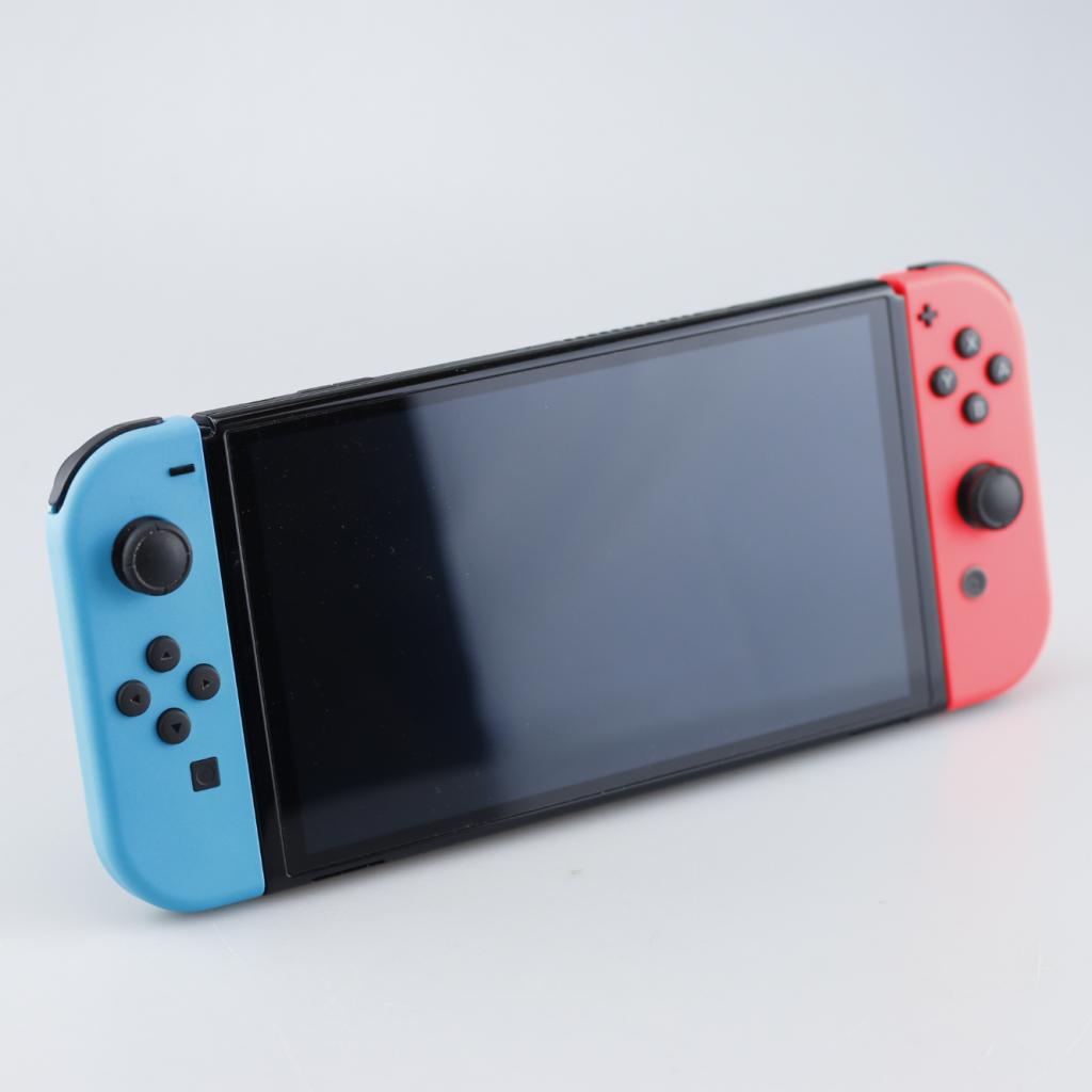 Nintendo Switch OLED 64GB Rood/Blauw, Spelcomputers en Games, Spelcomputers | Nintendo Switch, Nintendo, Zo goed als nieuw, Support@nintendo.com