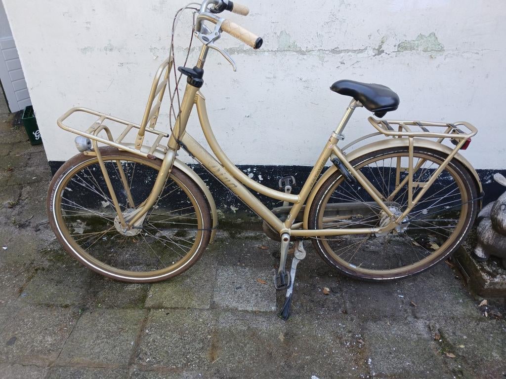 Gouden damesfiets met voordrager merk batavus diva, Ophalen