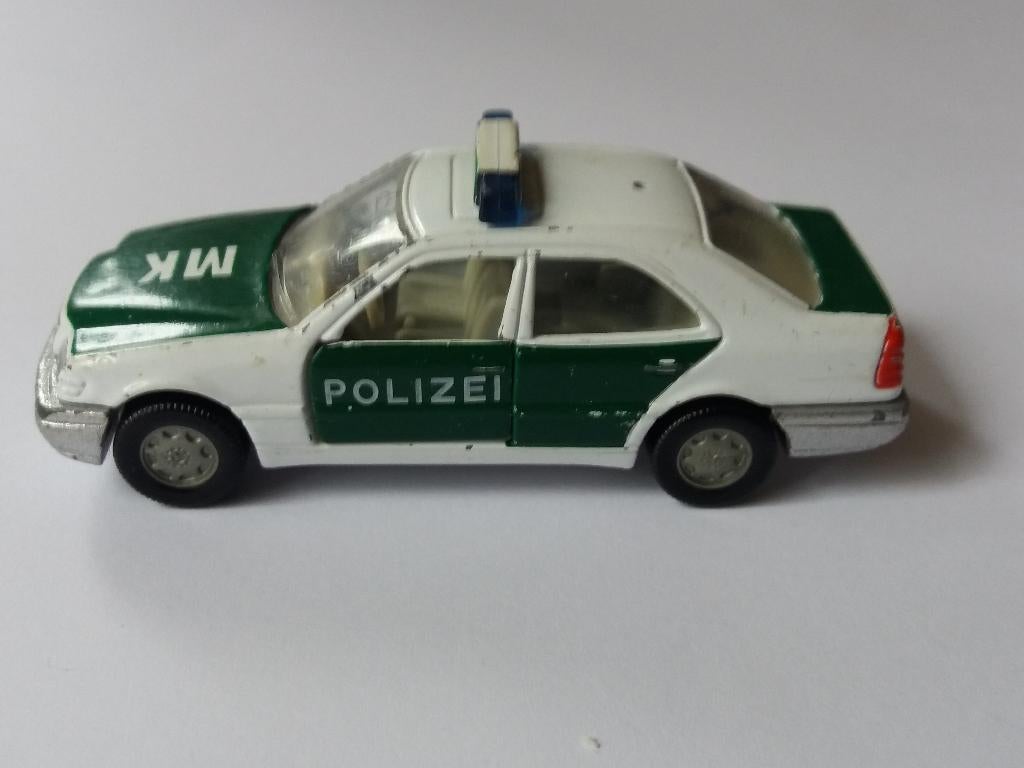 siku mercedes benz c 220 polizei, Hobby en Vrije tijd, Modelauto's | Overige schalen, Ophalen of Verzenden, Auto