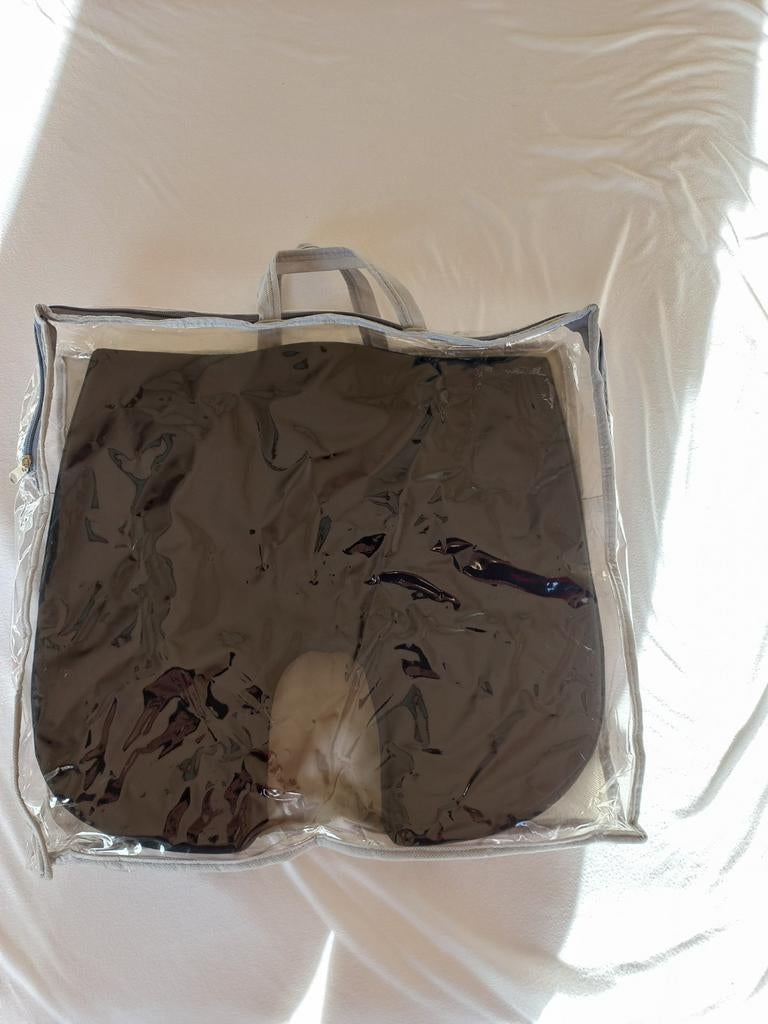 Stuit kussen, Ophalen