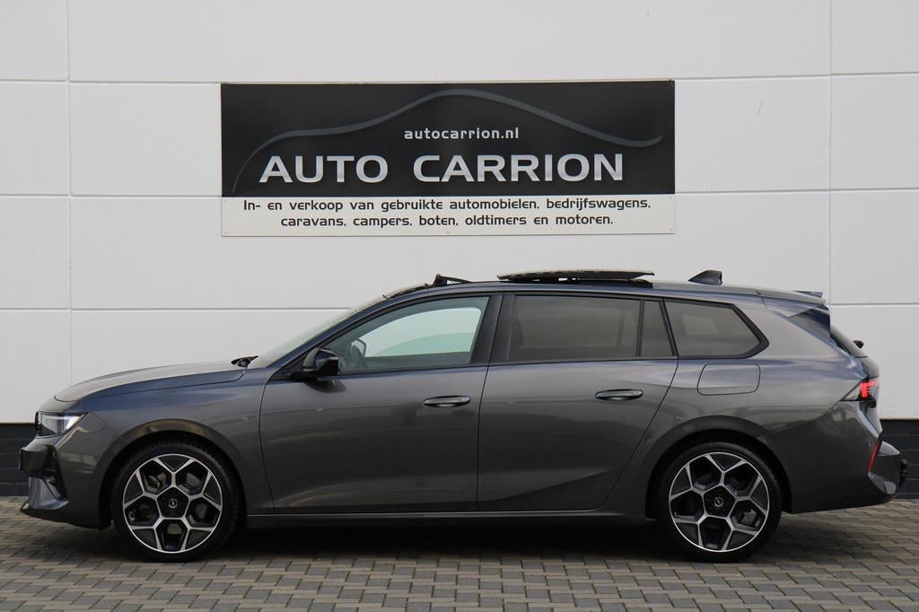 Opel Astra Sports Tourer 1.6 Turbo GS PHEV Pano HUD BTW !, Gebruikt, 4 cilinders, 179 pk, Leder en Stof