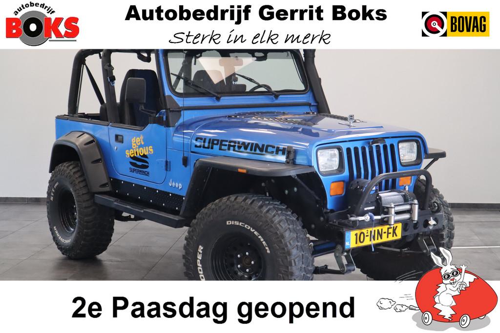 Jeep Wrangler 4.0i Softtop 4WD Luxe Leder Automaat Uniek LED, Cabriolet, Blauw, Leder, Vierwielaandrijving