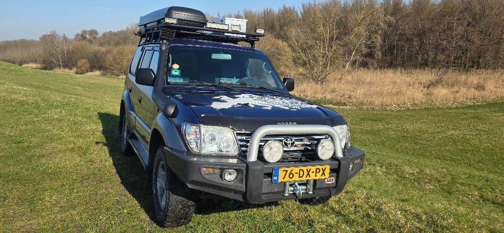Toyota Landcruiser 3.4 Challenger V6 5D 4WD 2000, Stof, Metallic lak, Blauw, Origineel Nederlands