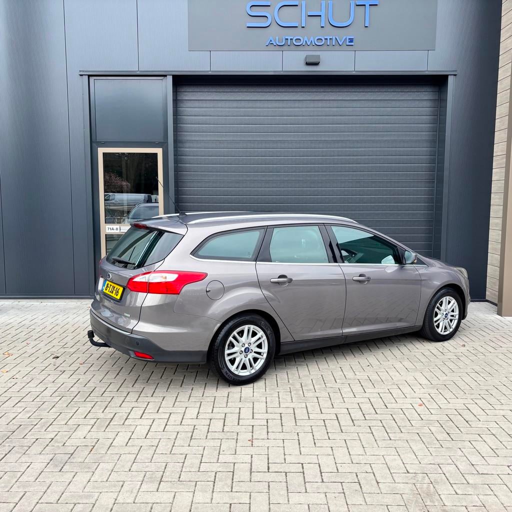 Ford Focus Wagon 125pk Titanium NAVI | CLIMATE CONTROL | CRU, Euro 5, Gebruikt, Zwart, Bruin