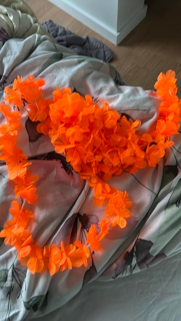 3 oranje Hawaïslinger €0,50 per stuk, Ophalen of Verzenden, Zo goed als nieuw, Oranje of Koningsdag