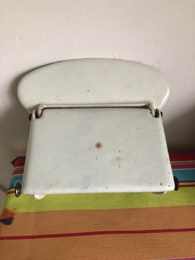 Gietijzeren WC-rolhouder, Ophalen