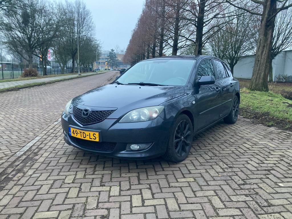 Stoere Mazda 3 1.6 Hatchback 2006 metallic, Voorwielaandrijving, 1160 kg, Stof, Parkeersensor