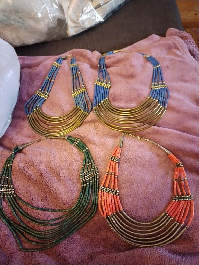 Afrikaanse (?) kettingen 10 euro per stuk, Kleding | Dames, Badmode en Zwemkleding, Ophalen of Verzenden, Blauw, Overige typen