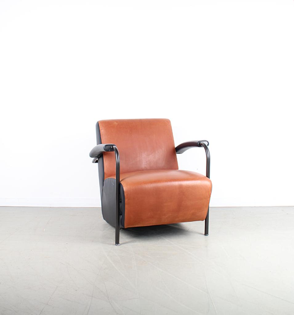 1x Leolux Scylla Fauteuil Laag Cognac/Zwart Leer – Zwart
