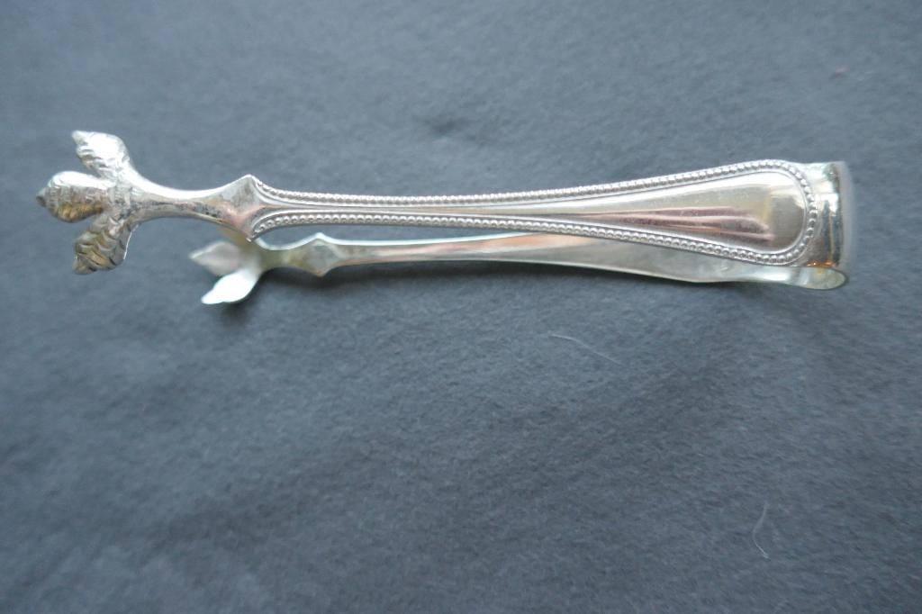 Gerritsen zilveren suikerklontjes tang klauwen mt = g.z., Ophalen of Verzenden, Zilver