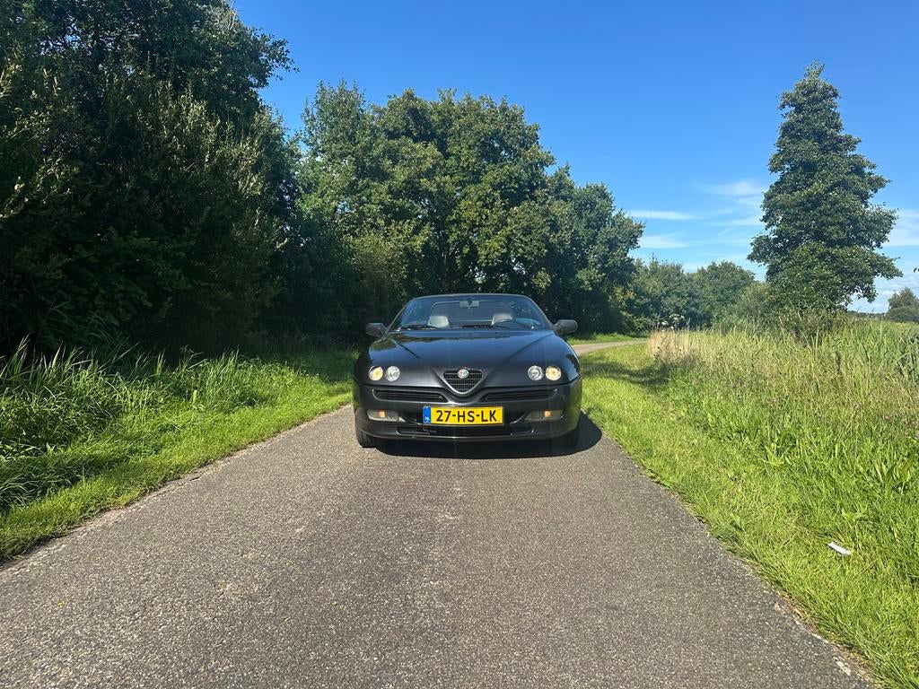 Alfa Romeo Spider 2.0 Twin Spark 16V 1997 Cappuccetto Rosso, Voorwielaandrijving, 1345 kg, Zwart, 4 cilinders