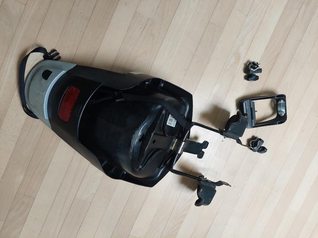 Fietsstoeltje met bevestiging op zadelpen, Ophalen