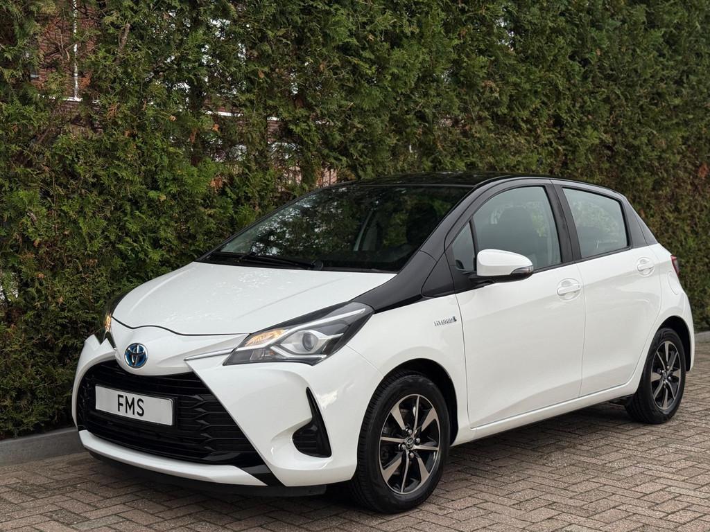 Toyota Yaris 1.5 Hybrid Bi-Tone Bluetooth, Zwart, 4 cilinders, Met garantie (alle), Wit