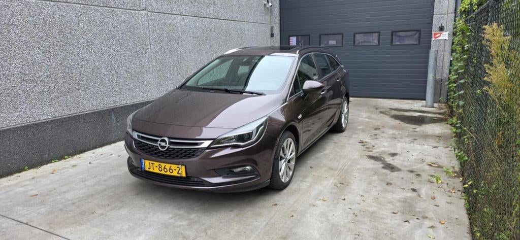 Opel Astra 1.0 Turbo 77KW Sports Tourer 2016 Bruin, Voorwielaandrijving, Stof, 1178 kg, Bruin