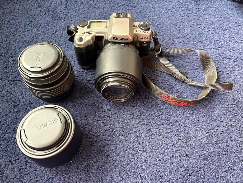 Analoge Sigma SA‑300 + 3 lenzen (35–80mm & 2 70–210mm), Ophalen of Verzenden, Gebruikt, Spiegelreflex, Overige Merken