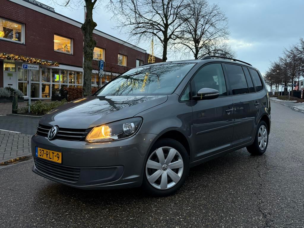 Volkswagen Touran 1.2 TSI 7P | Climate Control | NL Auto, Auto's, Volkswagen, Voorwielaandrijving, Euro 5, Zwart, 4 cilinders