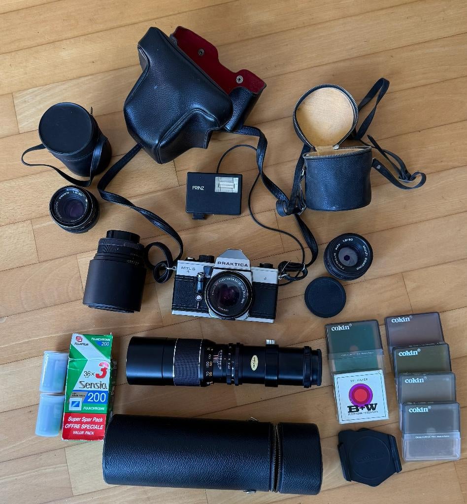 Praktica MTL5 spiegelreflex, lenzen,filters,rolletjes,flits, Ophalen of Verzenden, Gebruikt, Spiegelreflex, Overige Merken