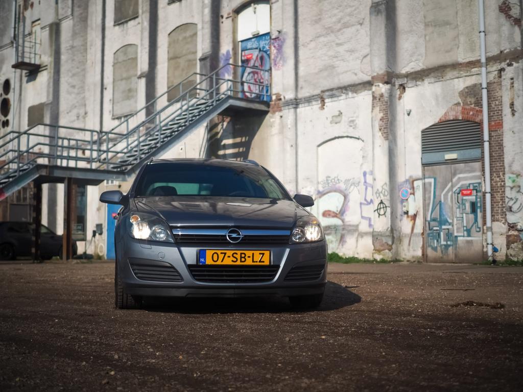 Opel Astra 1.6 16V St.wgn. 2005 Grijs, Auto's, Opel, Particulier, Astra, Benzine, B, Stationwagon, Handgeschakeld, Origineel Nederlands