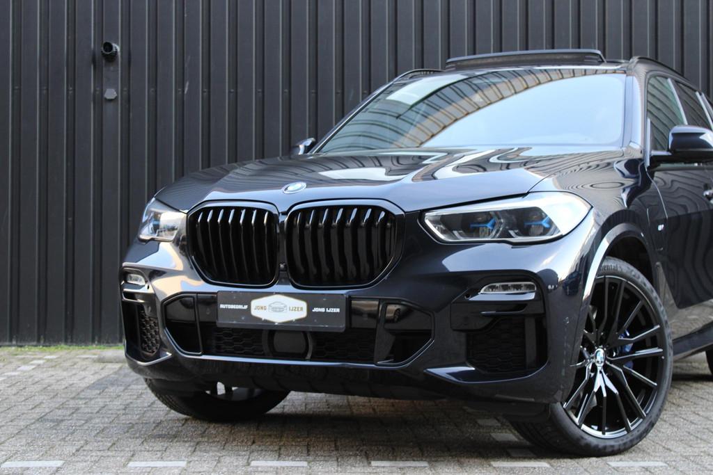 BMW X5 xDrive45e M SPORT PANO LASER HUD H&K TREKHAAK 360, Gebruikt, 394 pk, Zwart, Vierwielaandrijving