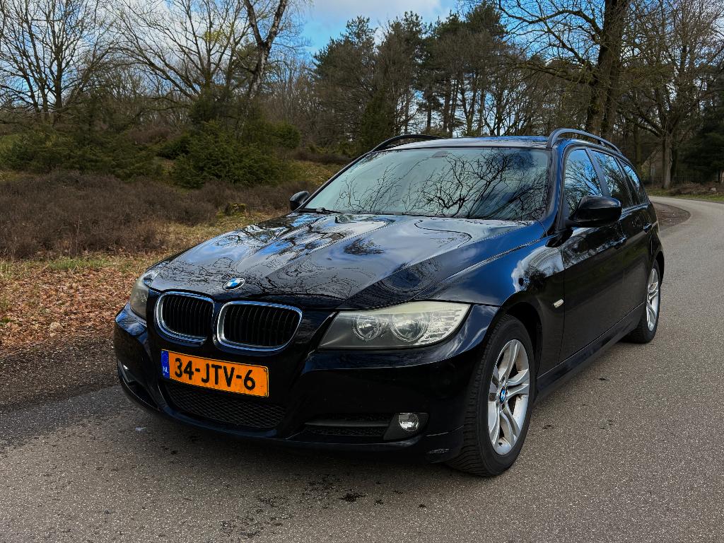 BMW 3-Serie 2.0 Touring 318i 2009 Cruise Leder Airco Navi, Auto's, BMW, Achterwielaandrijving, Zwart, Zwart, Handgeschakeld