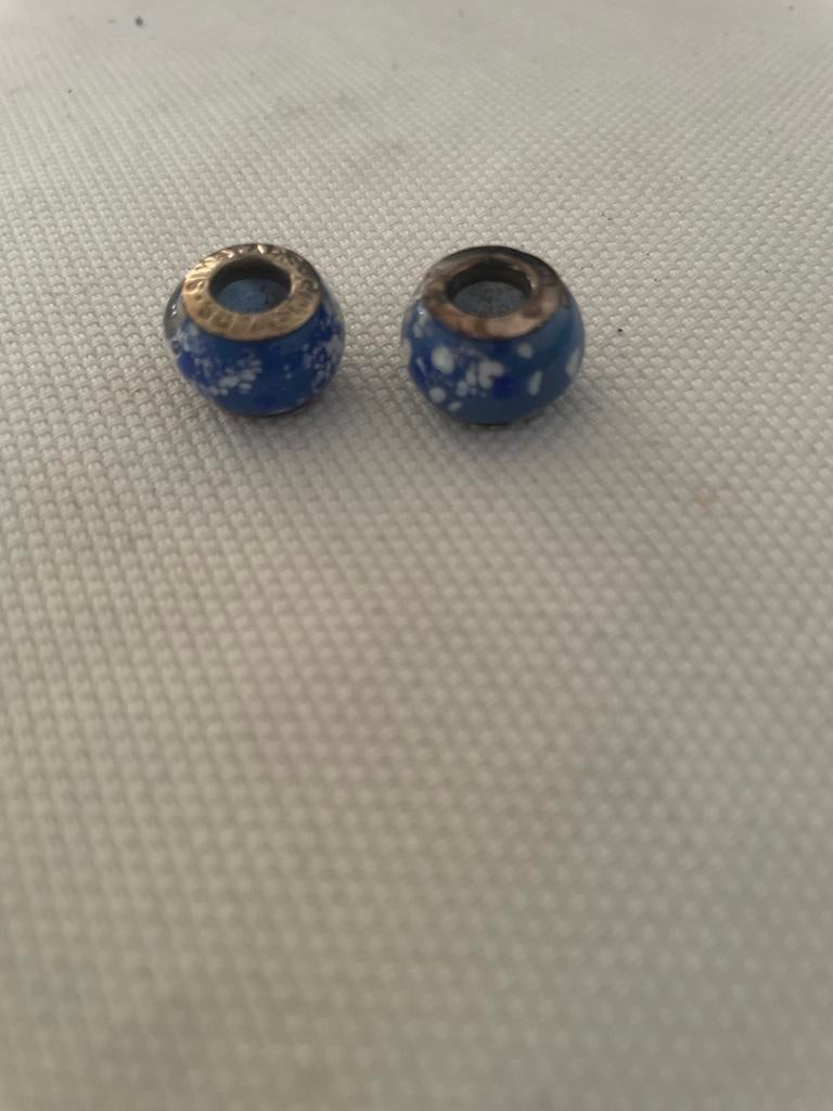 2x Simstars S925 Bedels Blauw Wit Gestippeld, Overige merken, Ophalen of Verzenden, Zo goed als nieuw, 2 of 3 bedels