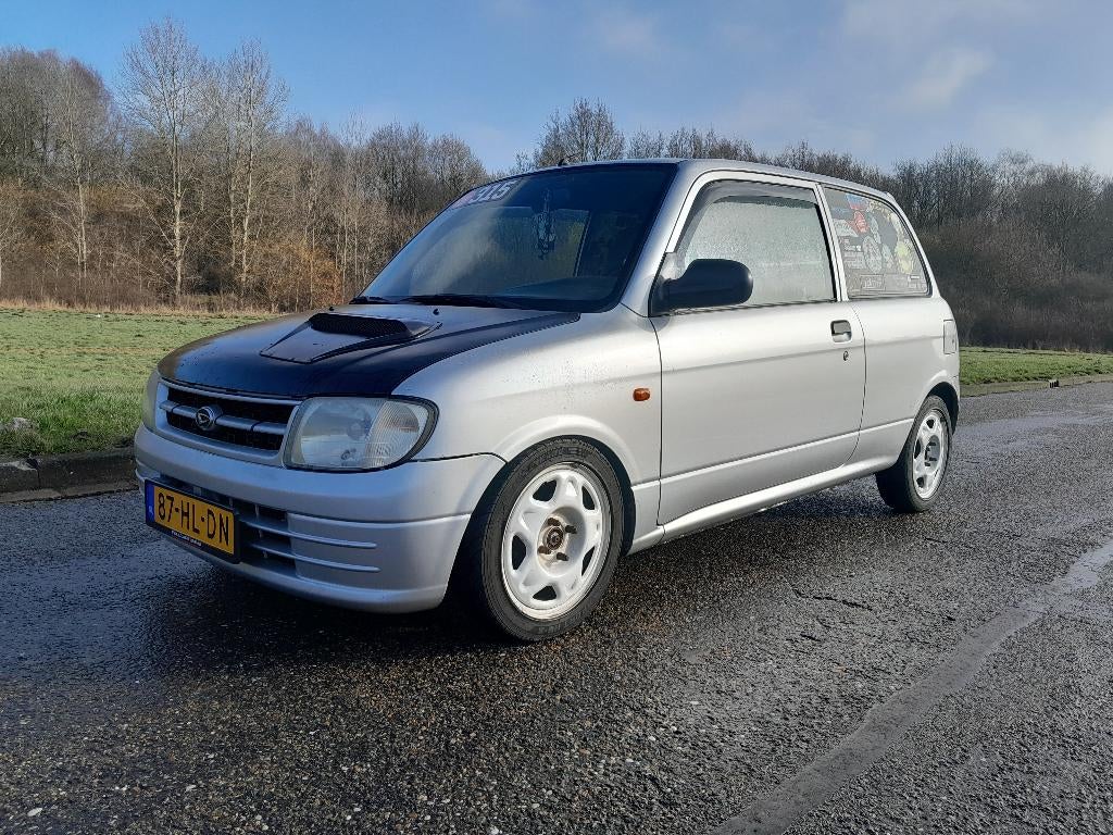 Daihatsu Cuore 1.0 STI 2001 Grijs, Auto's, Daihatsu, Voorwielaandrijving, 600 kg, 18 €/maand, 4 stoelen