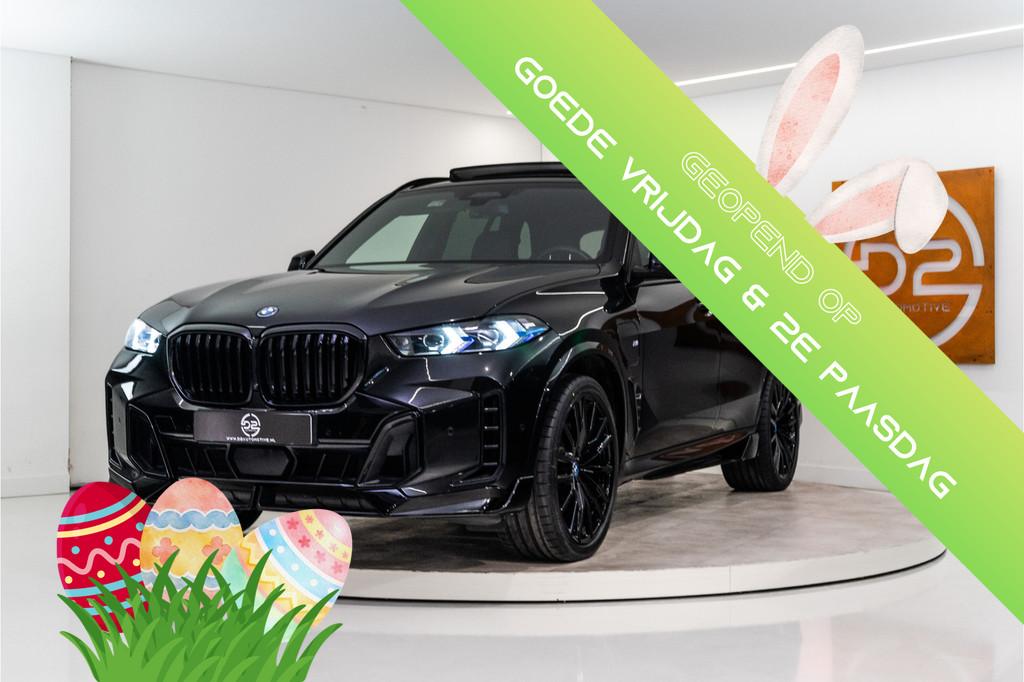 BMW X5 xDrive50e M-Sport 489PK | Bodykit | SkyLounge | Harma, 12 maanden, Gebruikt, 2395 kg, Zwart