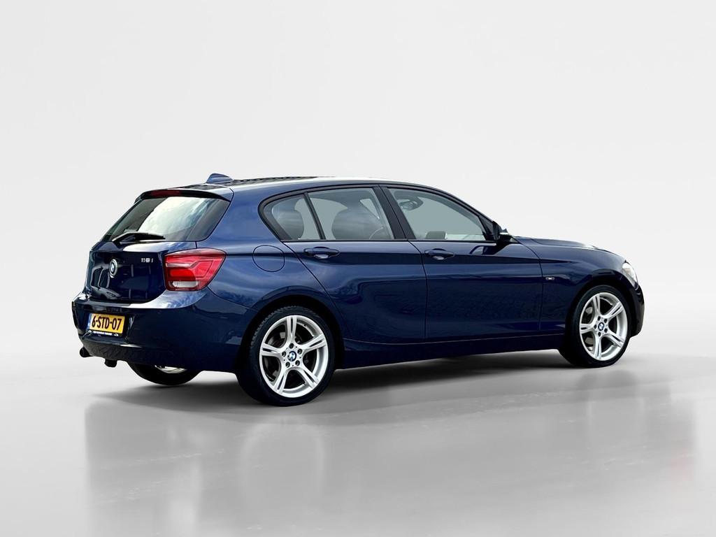 BMW 1-serie 116i High Executive Automaat | NAP | Stoelverwar, Gebruikt, Euro 6, 4 cilinders, Blauw