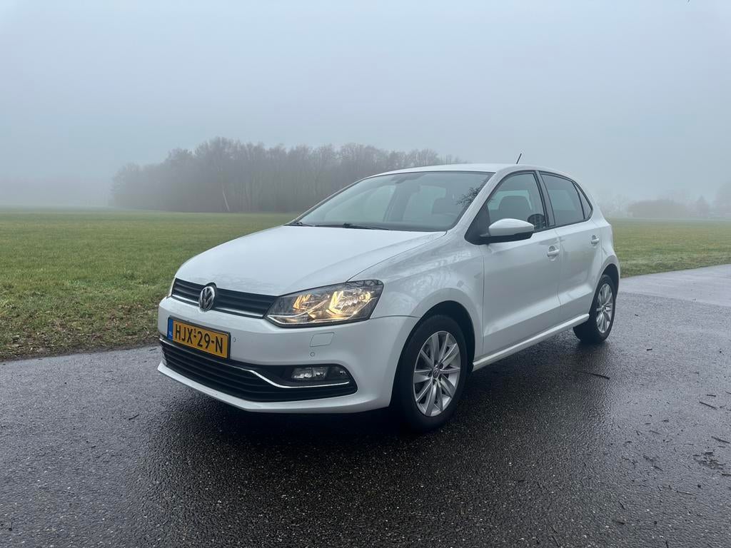 Volkswagen Polo 1.2 TSI 66KW DSG 2014 Wit, Auto's, 4 cilinders, 1039 kg, Wit, Particulier