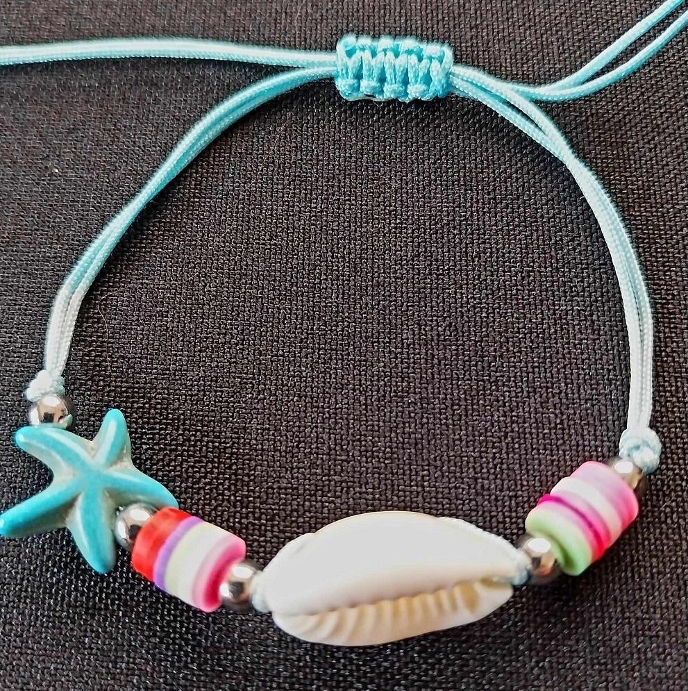armbandje turquoise schelp zeester, Ophalen of Verzenden, Nieuw, Blauw, Overige materialen