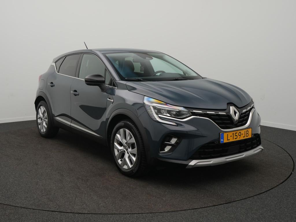 Renault Captur TCe 100 Bi-Fuel Intens - Occasion Lease vanaf, Auto's, Voorwielaandrijving, 12 maanden, Gebruikt, Blauw