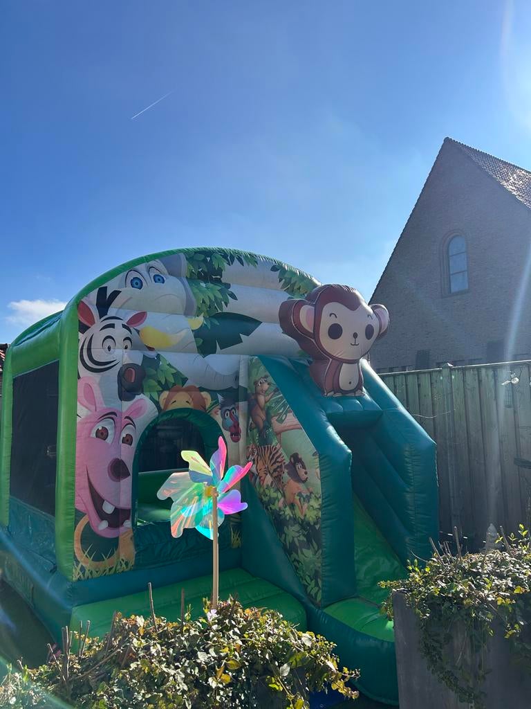 Springkussen met glijbaan Aapje - Jungle te huur - huren, Ophalen, Zo goed als nieuw, Overige