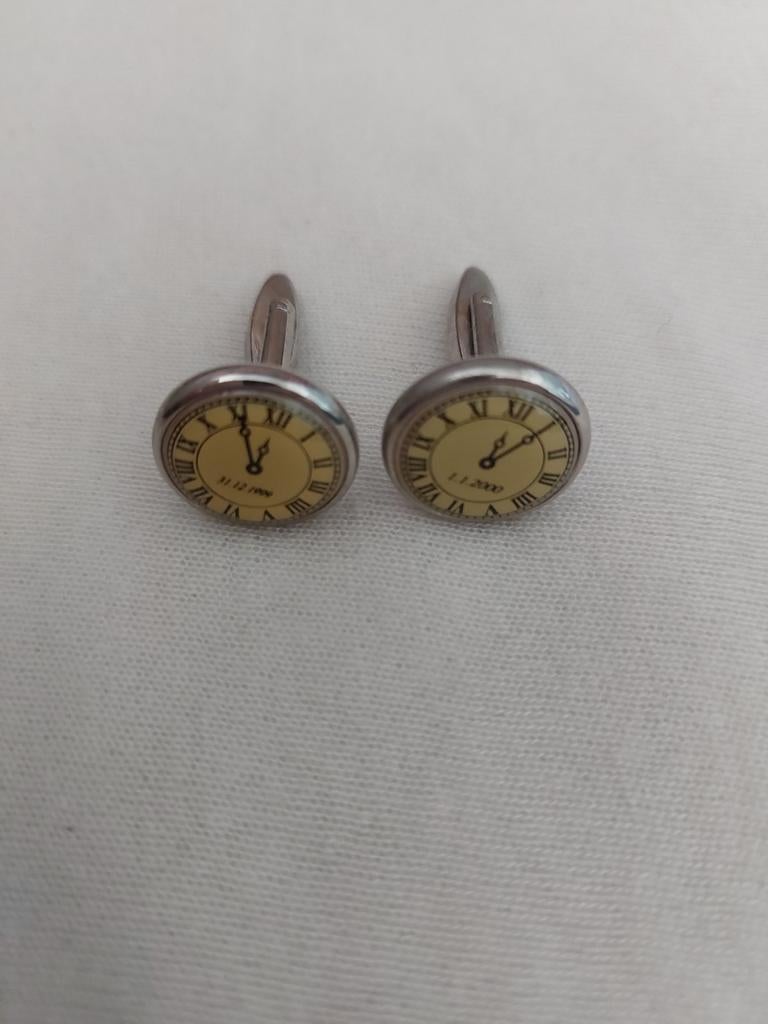 Manchetknopen eeuwwisseling 31.12.1999 en 1.1.2000, Ophalen