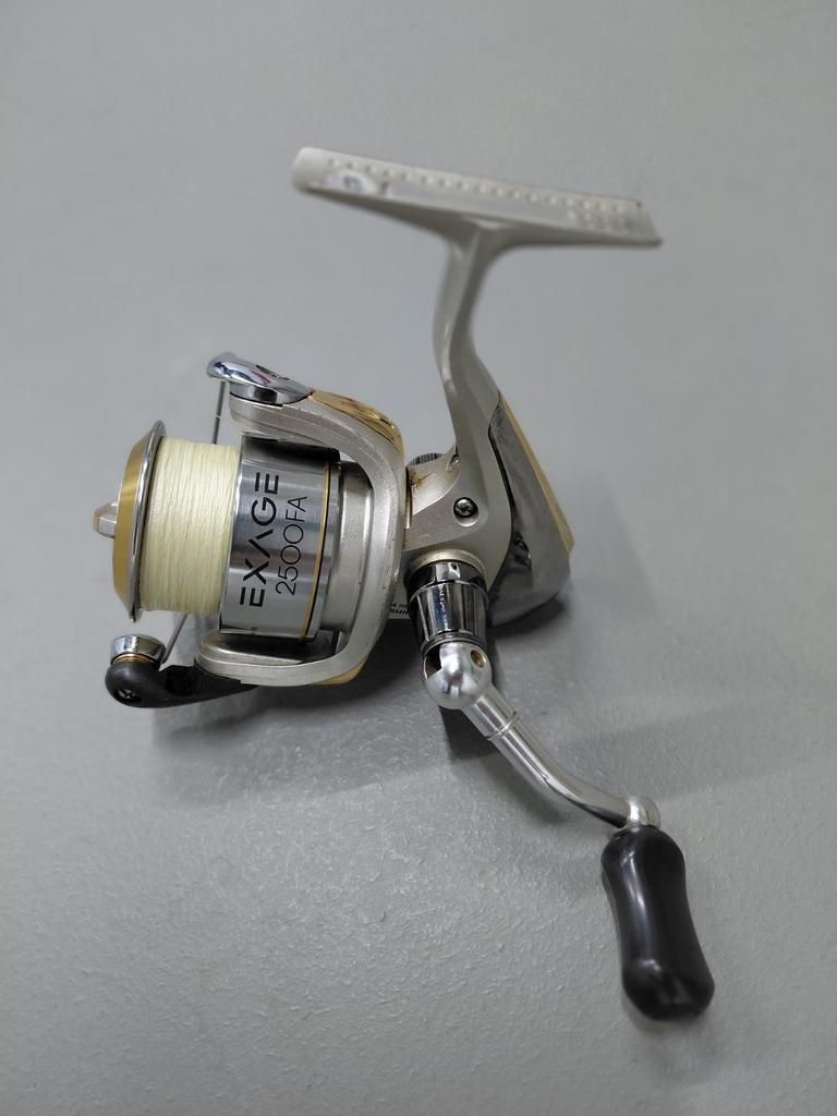 Mooie Shimano Exage 2500FA 4bb spinmolen + reserve spoel, Ophalen of Verzenden, Zo goed als nieuw, Molen