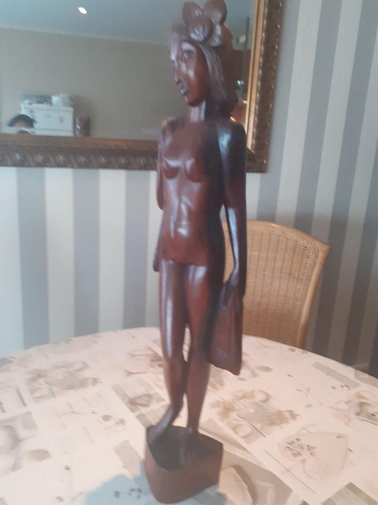 houten beeld, Ophalen