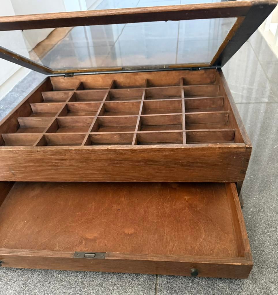 Klassieke zetbak voor loden letters, Ophalen