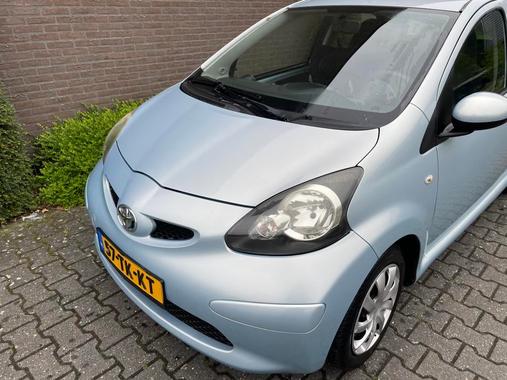 Toyota Aygo 1.0 12V Vvt-i 5DRS 2006 Blauw Airco, Auto's, Voorwielaandrijving, 68 pk, Origineel Nederlands, Handgeschakeld
