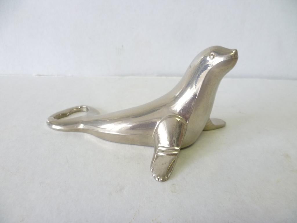 Flesopener model Zeehond zilverkleurig metaal 12cm lang., Ophalen of Verzenden