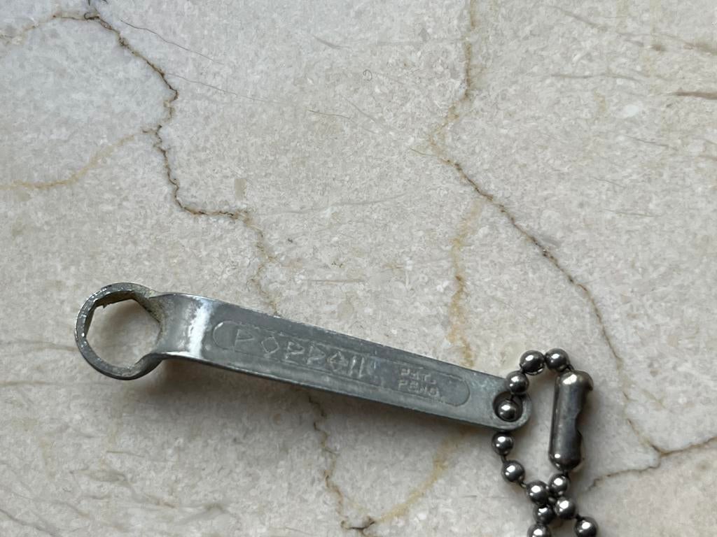Vintage sleuteltje voor poppell aansteker, Ophalen of Verzenden, Zo goed als nieuw