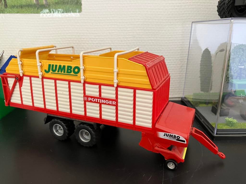 pottinger opraapwagen siku 1:32, Hobby en Vrije tijd, Modelauto's | 1:32, Ophalen of Verzenden, Tractor of Landbouw, SIKU