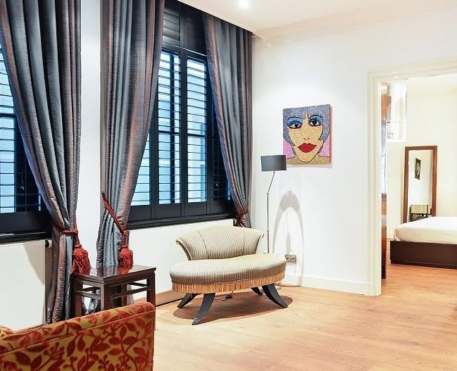 Fauteuil met iconisch ontwerp., Ophalen