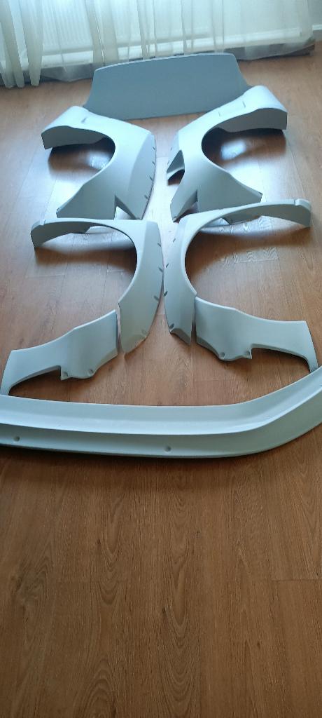 Voor VW Golf 7  Bodykit GFK  NIEUW, Volkswagen, Nieuw, Ophalen of Verzenden, Bumper