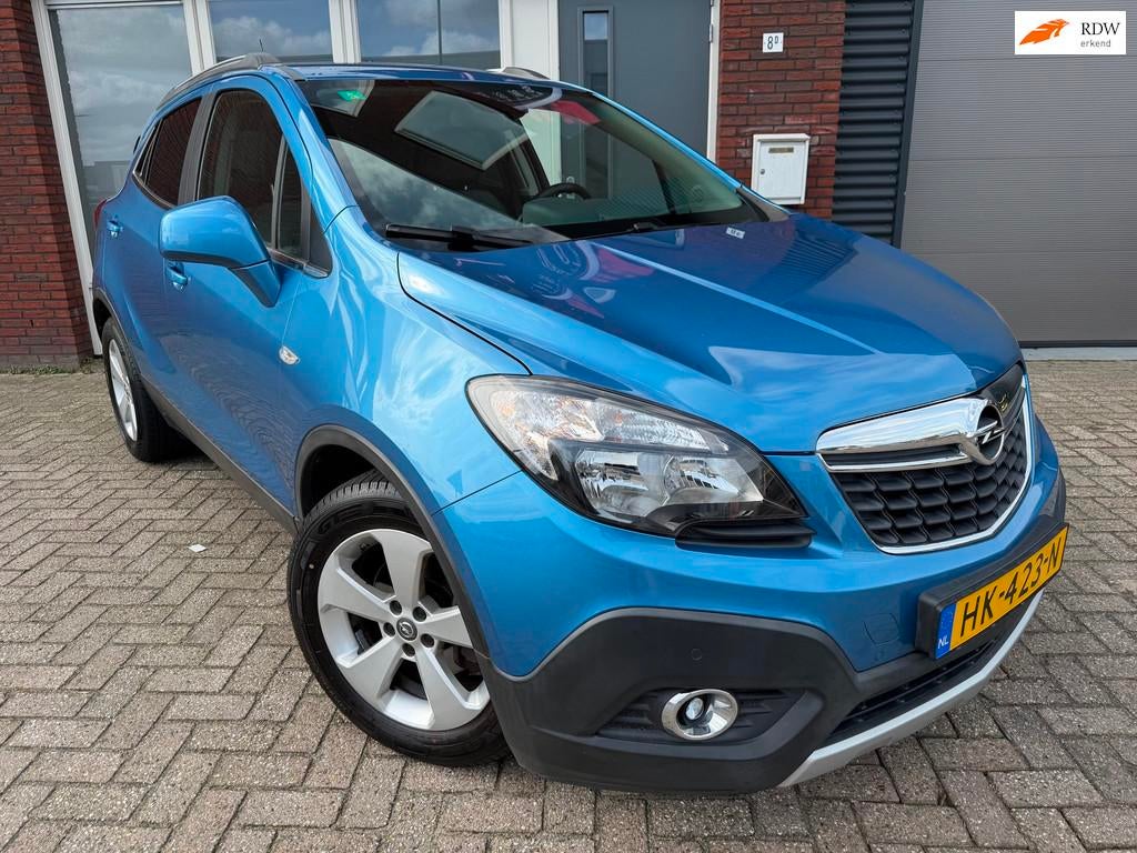 Opel Mokka 1.4 T Cosmo / Camera / Leder / Navi / PDC / NAP, Auto's, Voorwielaandrijving, Gebruikt, 4 cilinders, Met garantie (alle)